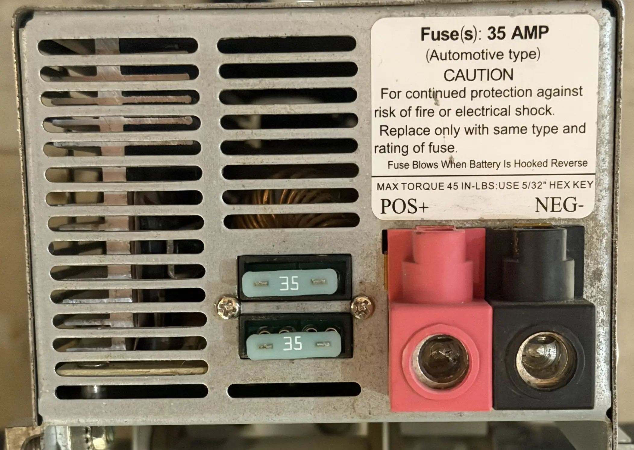 WFCO WF-9855 RV power converter charger terminal side showing 12V DC connections