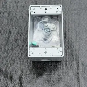 BWF B-5V 1-gang weatherproof box interior with green ground screw, device mounting ears and hardware bag