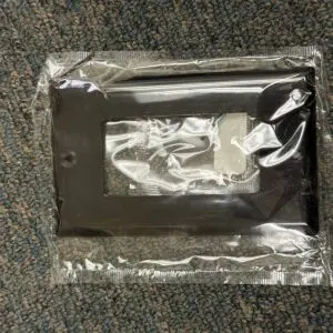 New Cooper Eaton 5151BK black 1-gang decorator wallplate sealed in its bag with screws