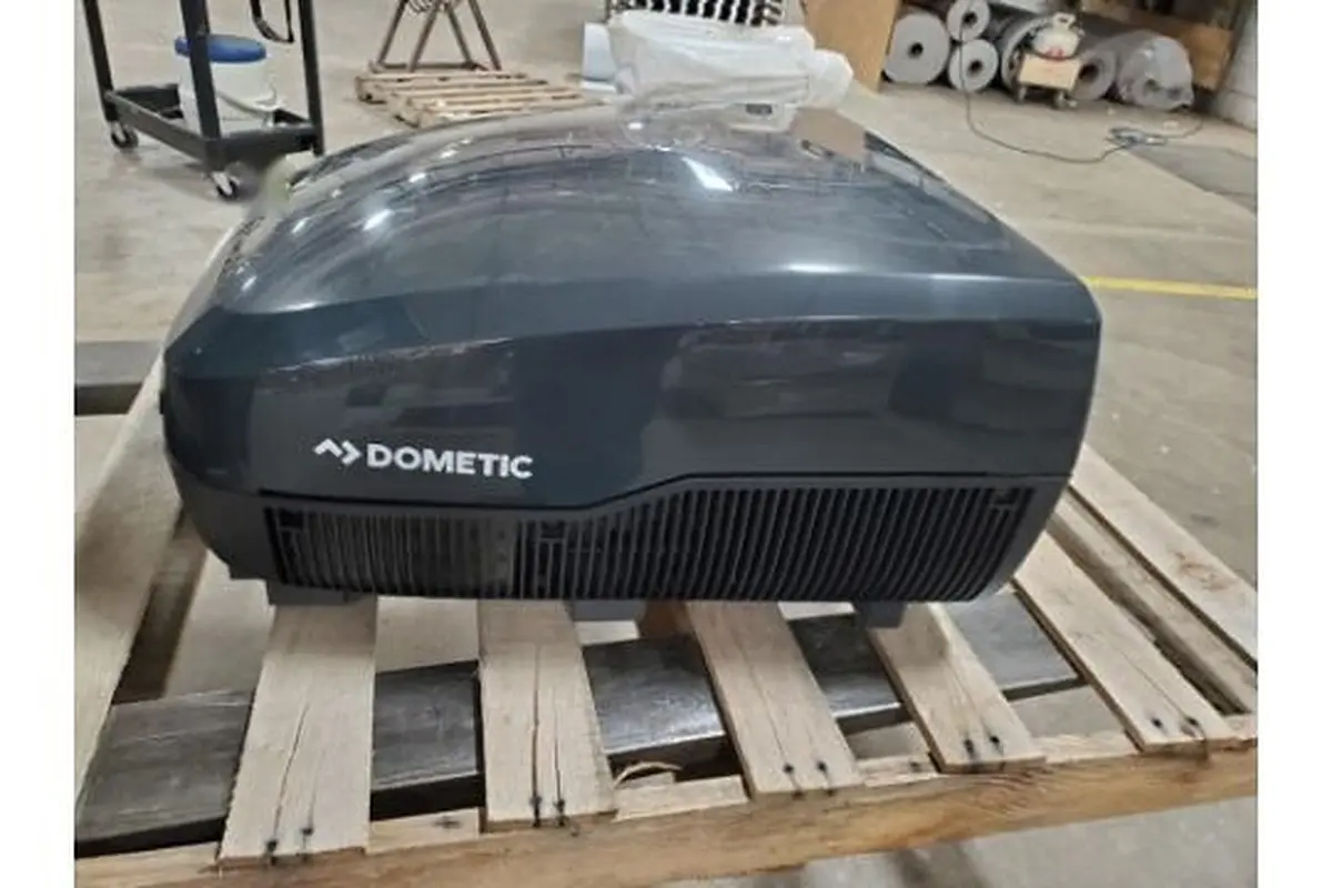 Front view of new Dometic FreshJet 3 RV roof AC with Dometic logo